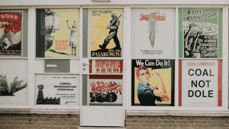 A Variety of Posters on a Storefront