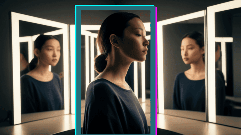 Woman Looking in Illuminated Vanity Mirror