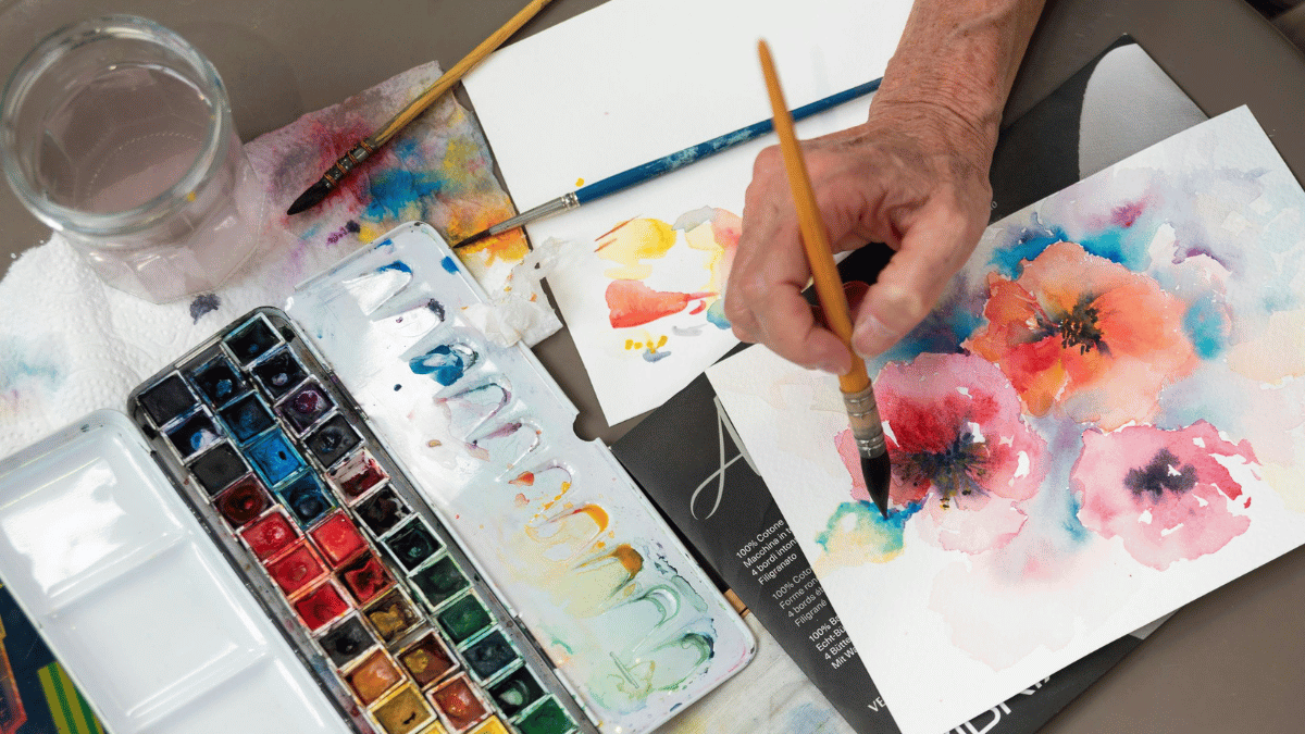 Artist Creating Colorful Floral Watercolor Painting