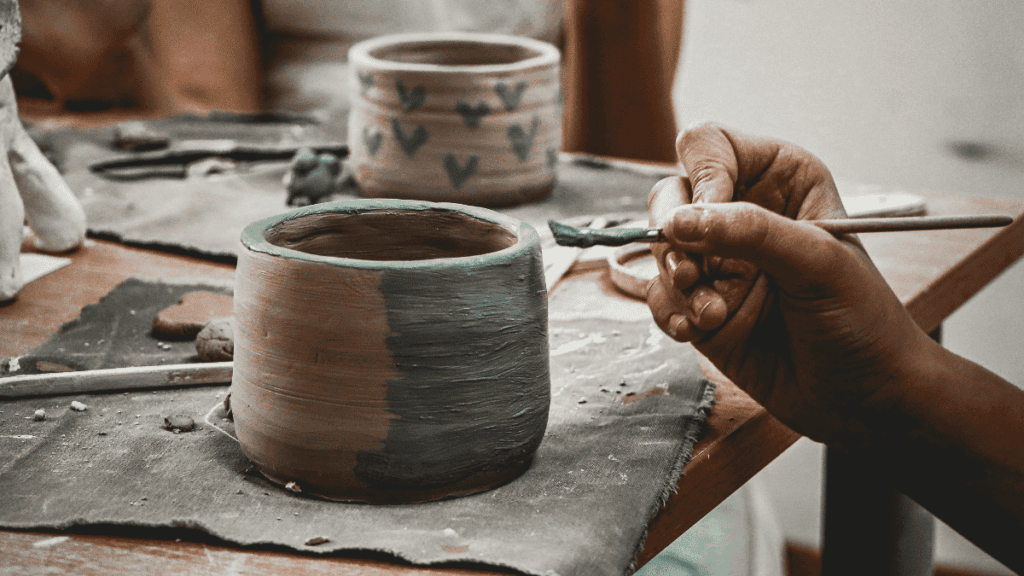 Hands Crafting Pottery with Artistic Precision