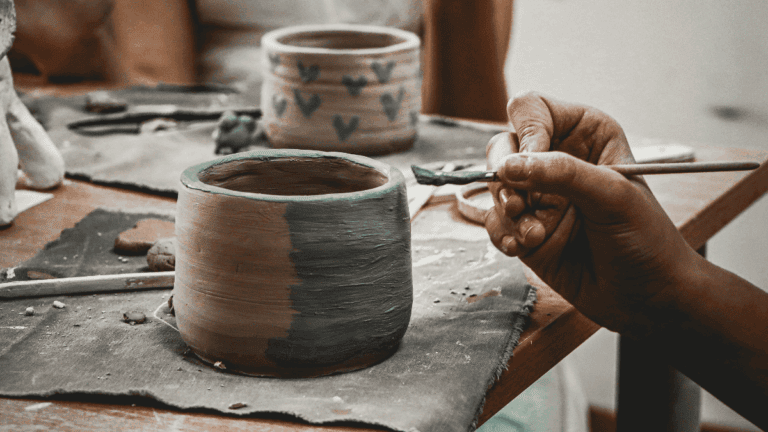Hands Crafting Pottery with Artistic Precision