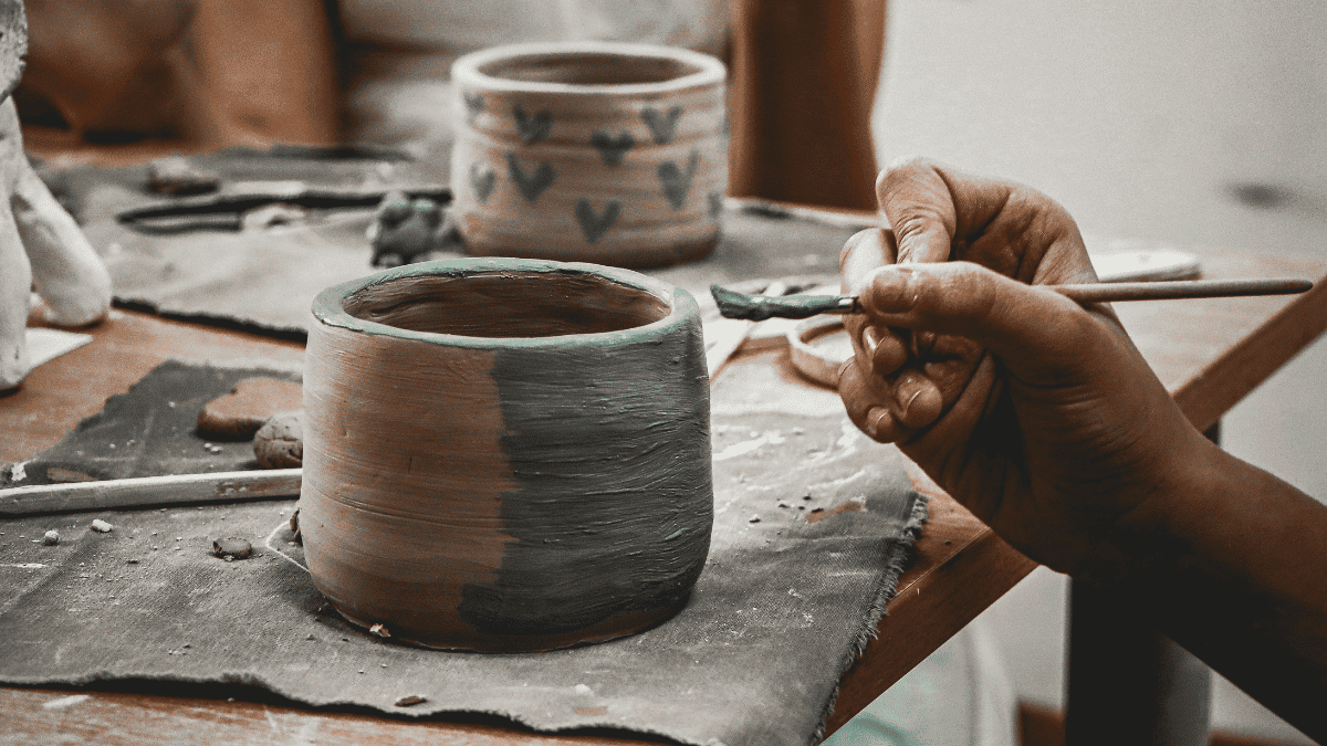Hands Crafting Pottery with Artistic Precision