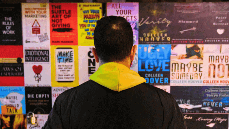 person standing in front of a poster